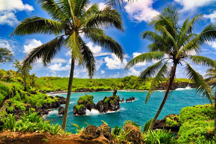 planning a trip to Hawaii Black sand beach located on the road to hana on Maui